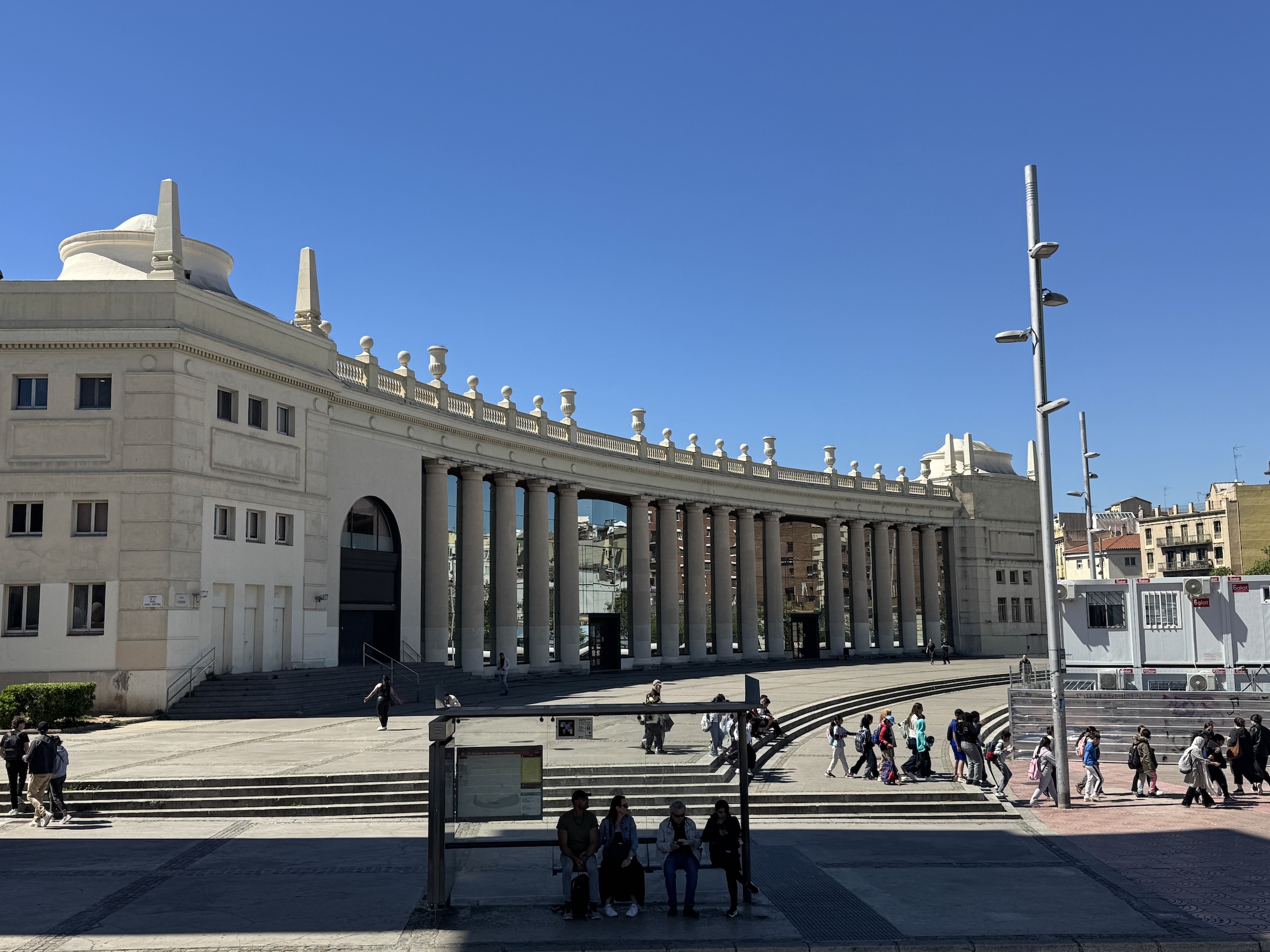 Giant, gorgeous conference hall with big white stone columns.
