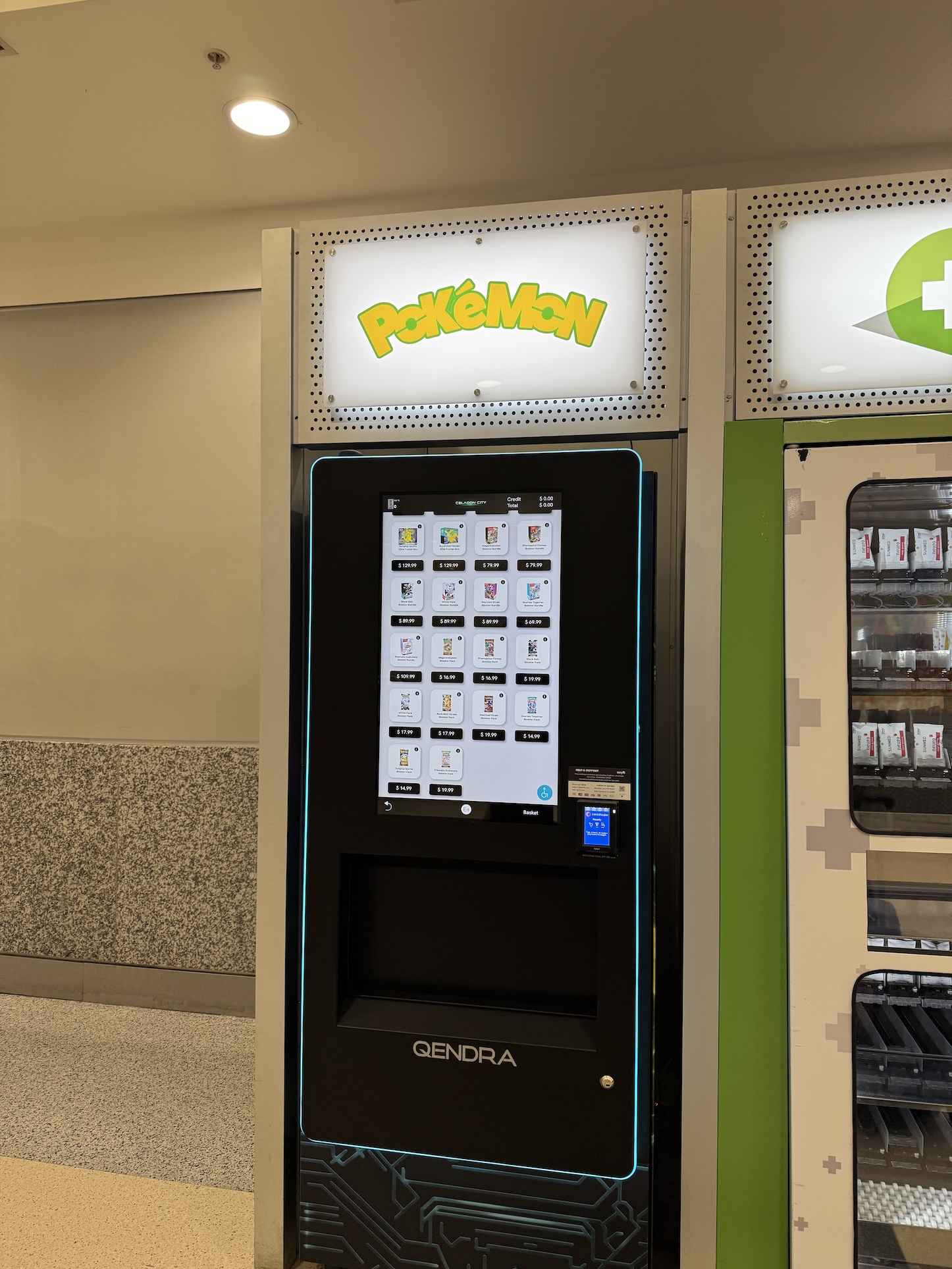 Another dispenser machine filled with Pokemon trading card packs.